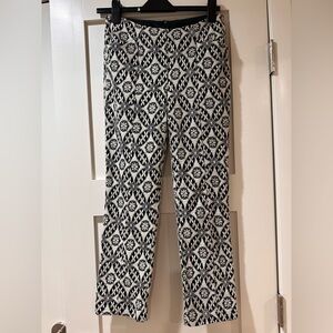 Corey Lynn Calter size 4 lace pants, cream lace on black background